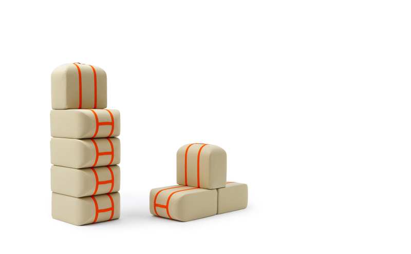 Illustration for article titled This Shape-Shifting Sofa Stacks Itself Like Suitcases